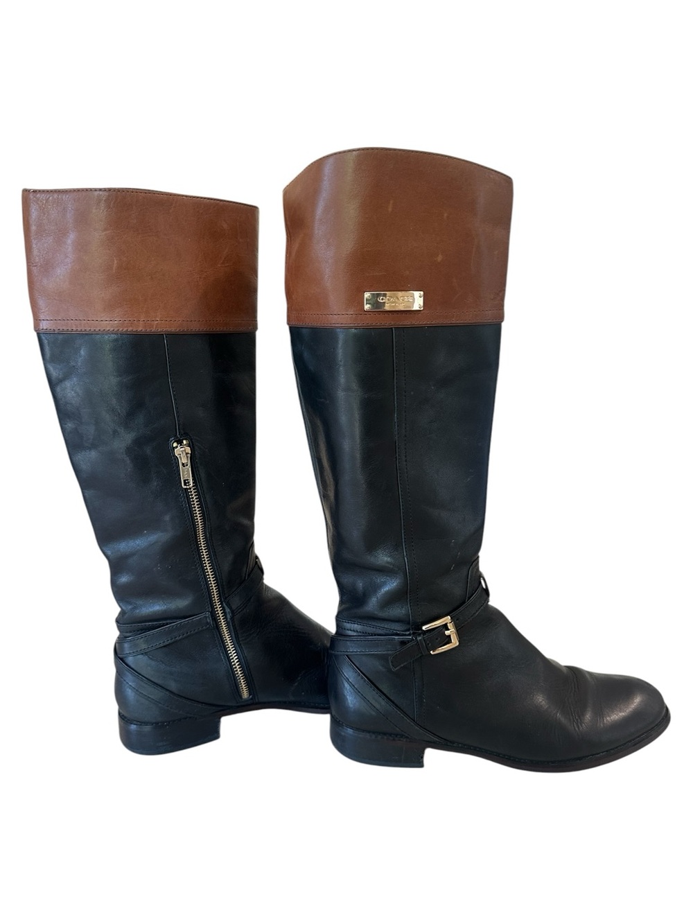 Coach two toned leather riding boots. Black and brown knee-high boots.